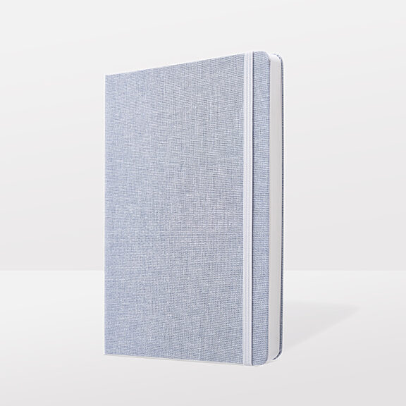 Grey fabric notebook with fine texture and light blue ribbon