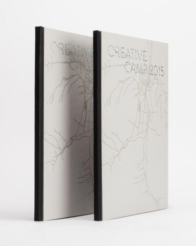 Two notebooks with the imprint 'Creative Camp'